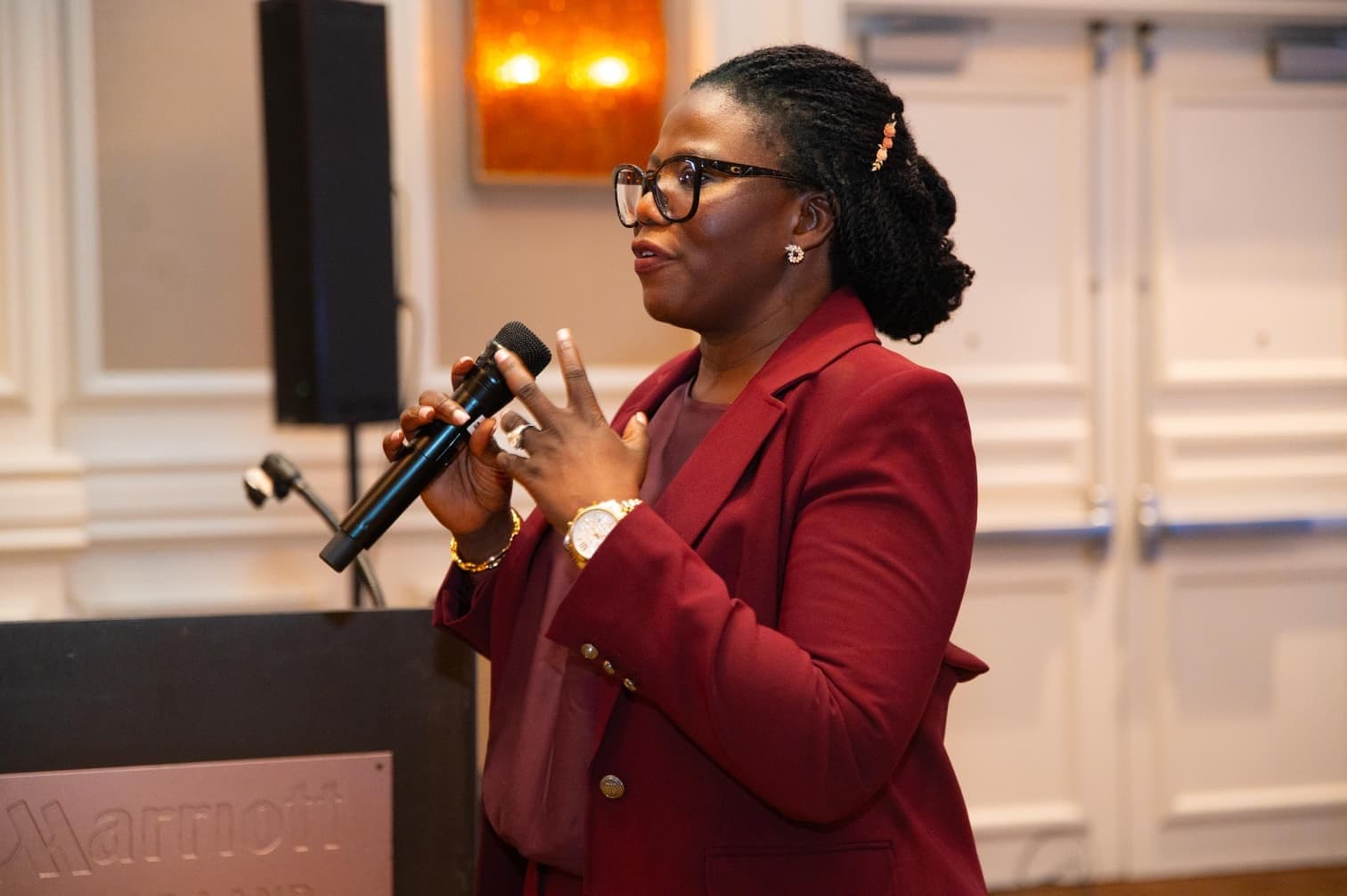 Dr. Laide Alexander speaking at the conference