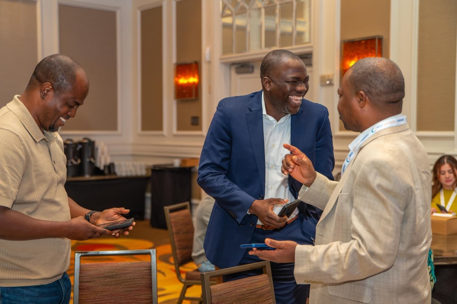 Two attendees in conversation